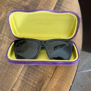 Gucci GG0057skn sunglasses.